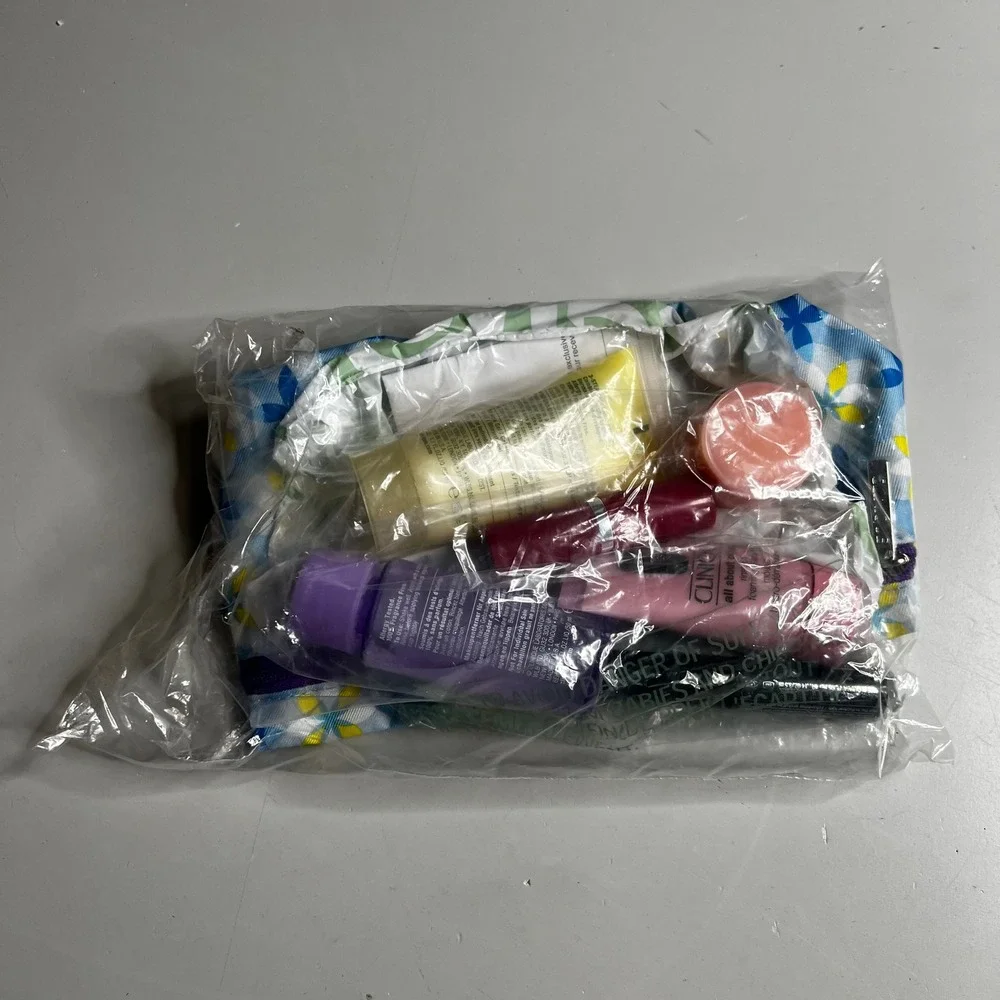 Clinique Skincare and Makeup Travel Set with Floral Cosmetic Bag‎ New